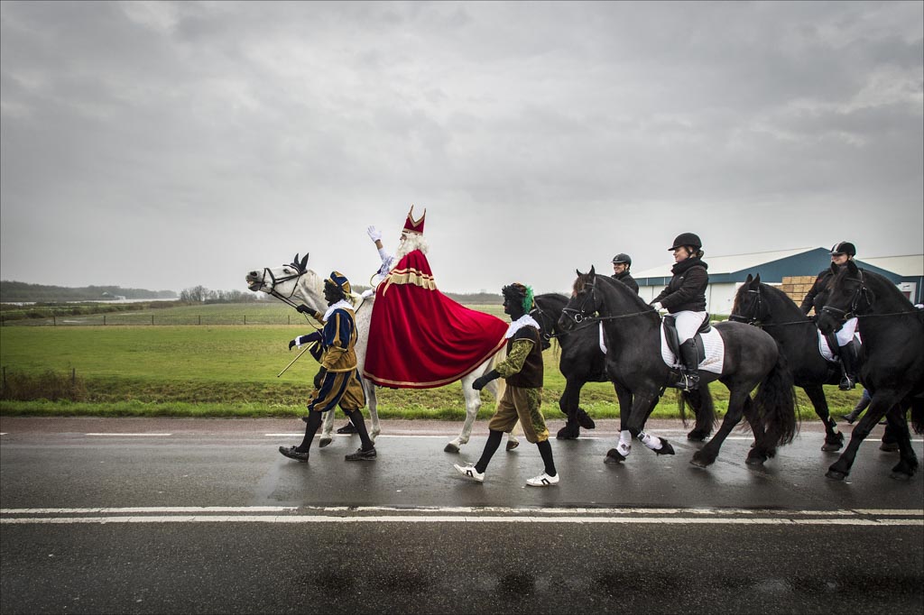 The arrival ride of the Dutch saint Sinterklaas in the small Dutch northern town of Anna Palowna.