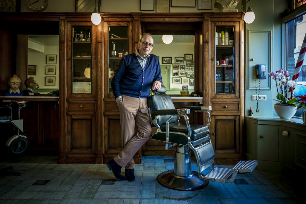 Retired barber Buch in his shop